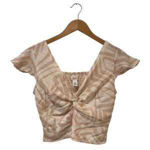 Japra Abstract Patterned Cream and white crop Top wrap knot twist size M